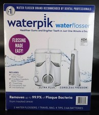 Waterpik Ultra Plus Cordless Freedom Water Flosser w/ Travel Bag Accessories