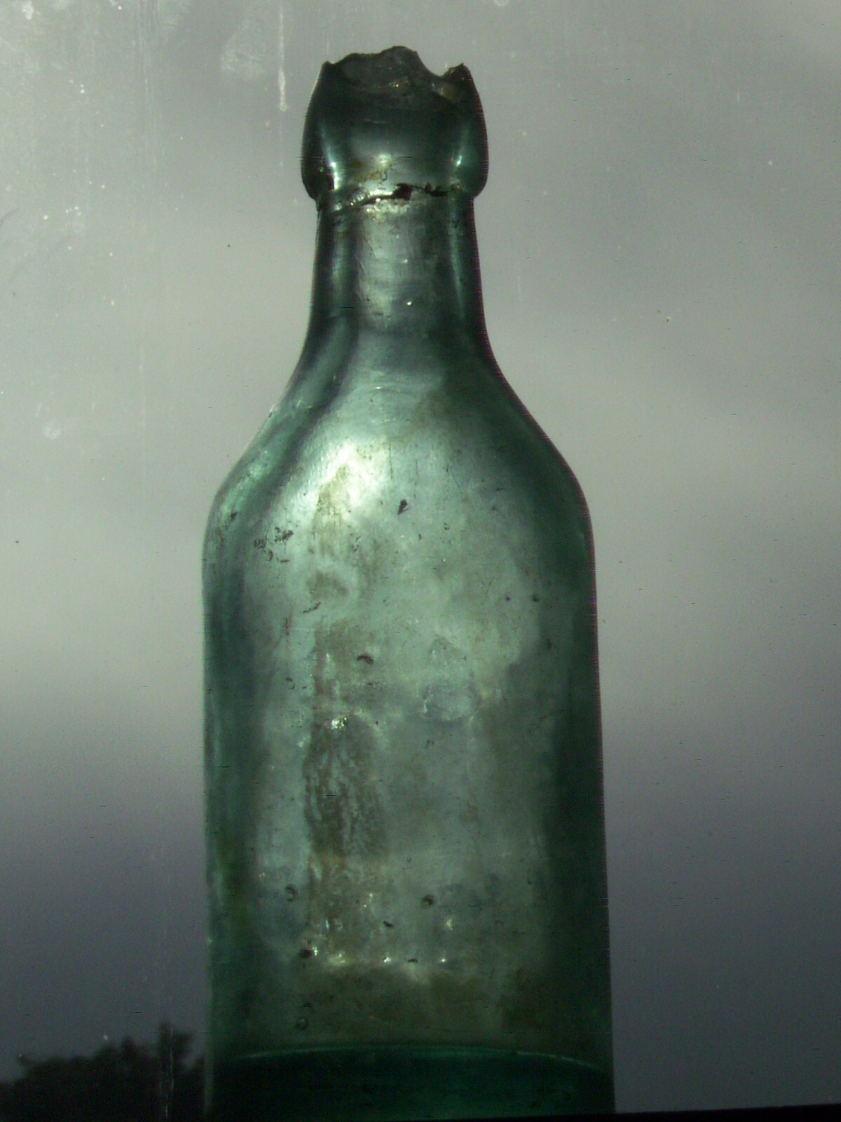 Vintage blue embossed  E. Marsili Harrisburg, Pa. affixed blob top glass bottle