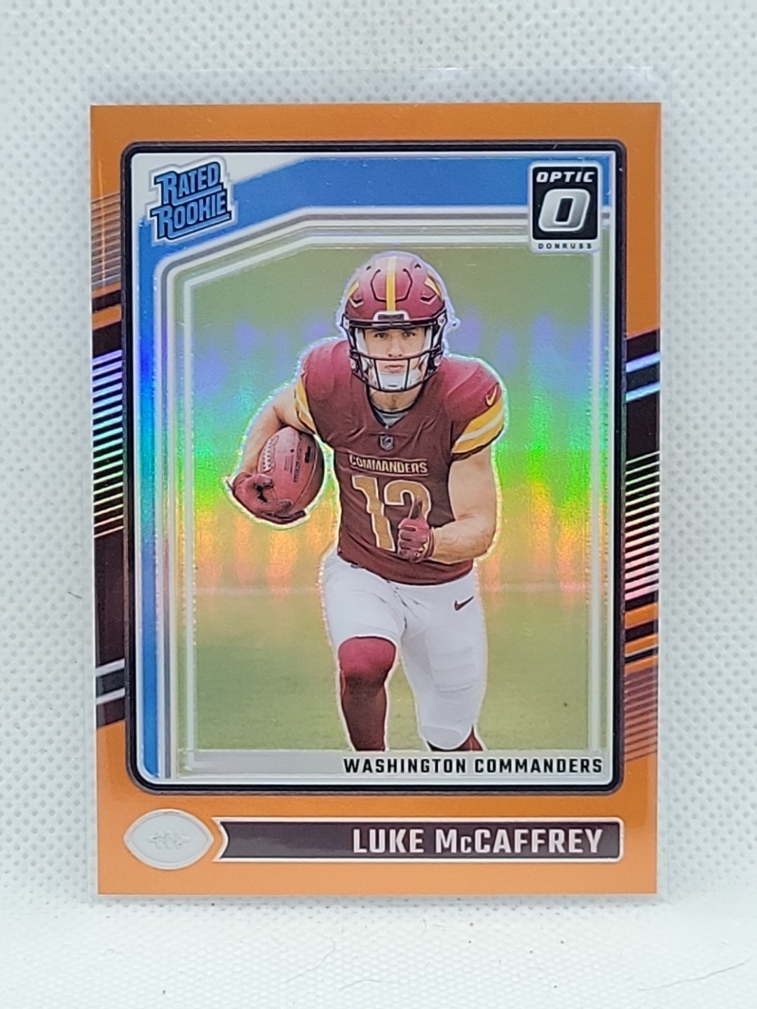 Luke McCaffrey 2024 Donruss Optic  Orange Prizm Rookie  #268 NrMt Ser #83/249