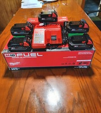 5X NEW--Genuine Milwaukee M18 Batteries And New Charger.