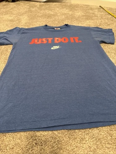 80s Nike Tee Light Blue Size Large Fits Small Made I 1980s vintage concert t-shirt, vintage, size L, single stitch, B+ condition