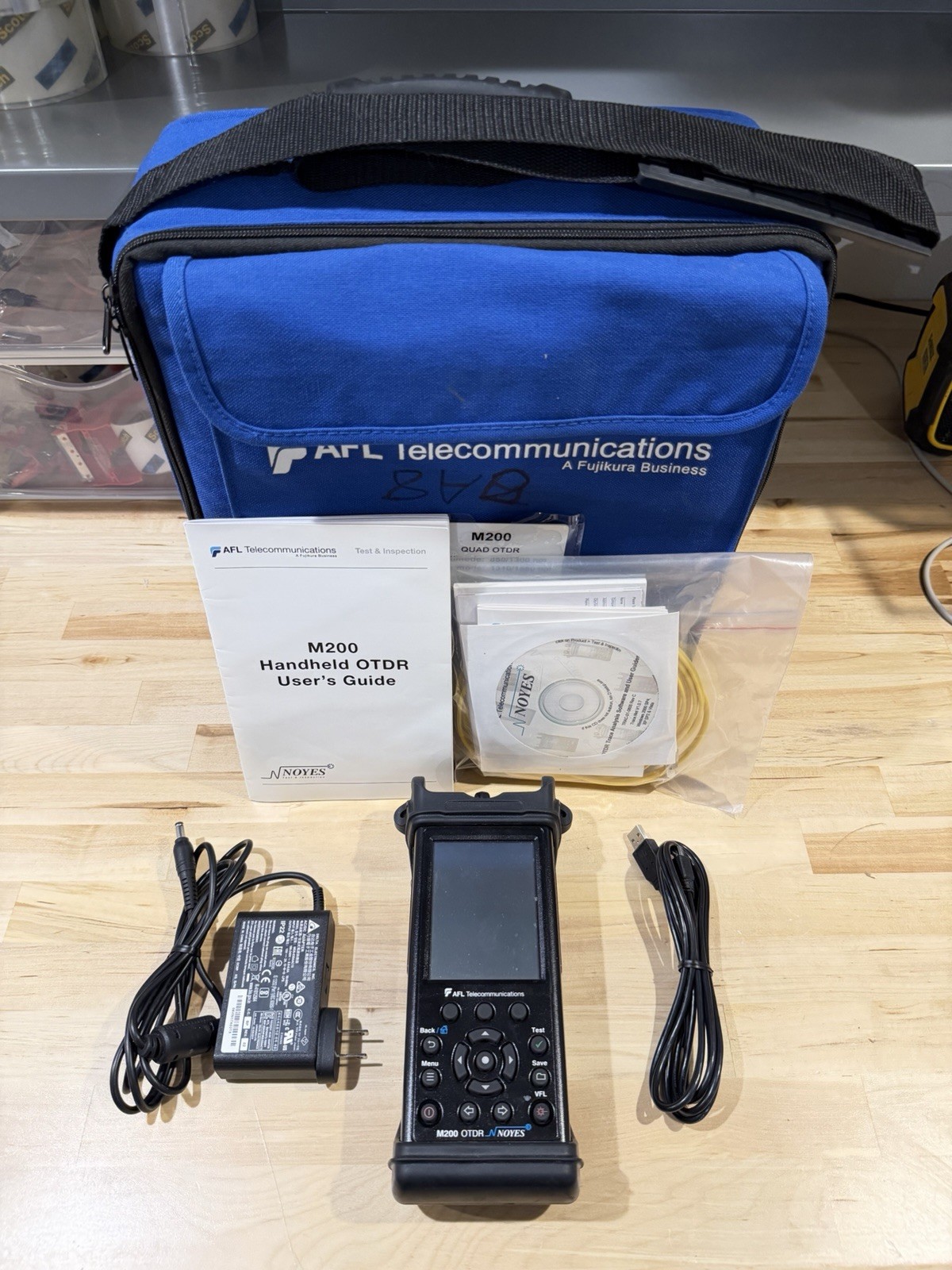 AFL NOYES M200 OTDR SM 1310/1550 W/ ACCESSORIES- PARTS ONLY (FOR PARTS)