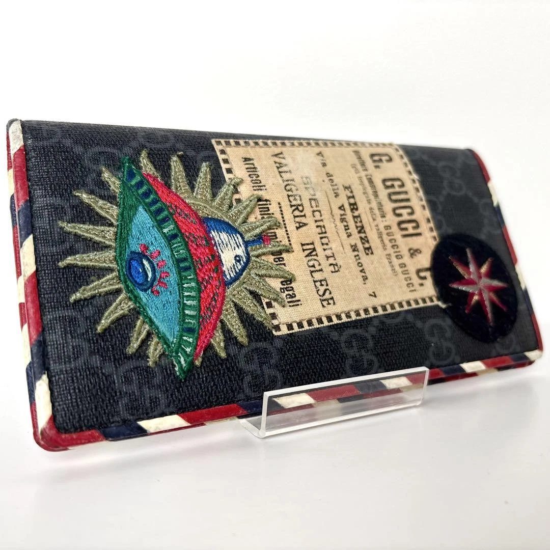 Rare portefeuille long GUCCI Night Courier GG Supreme UFO Wallet
