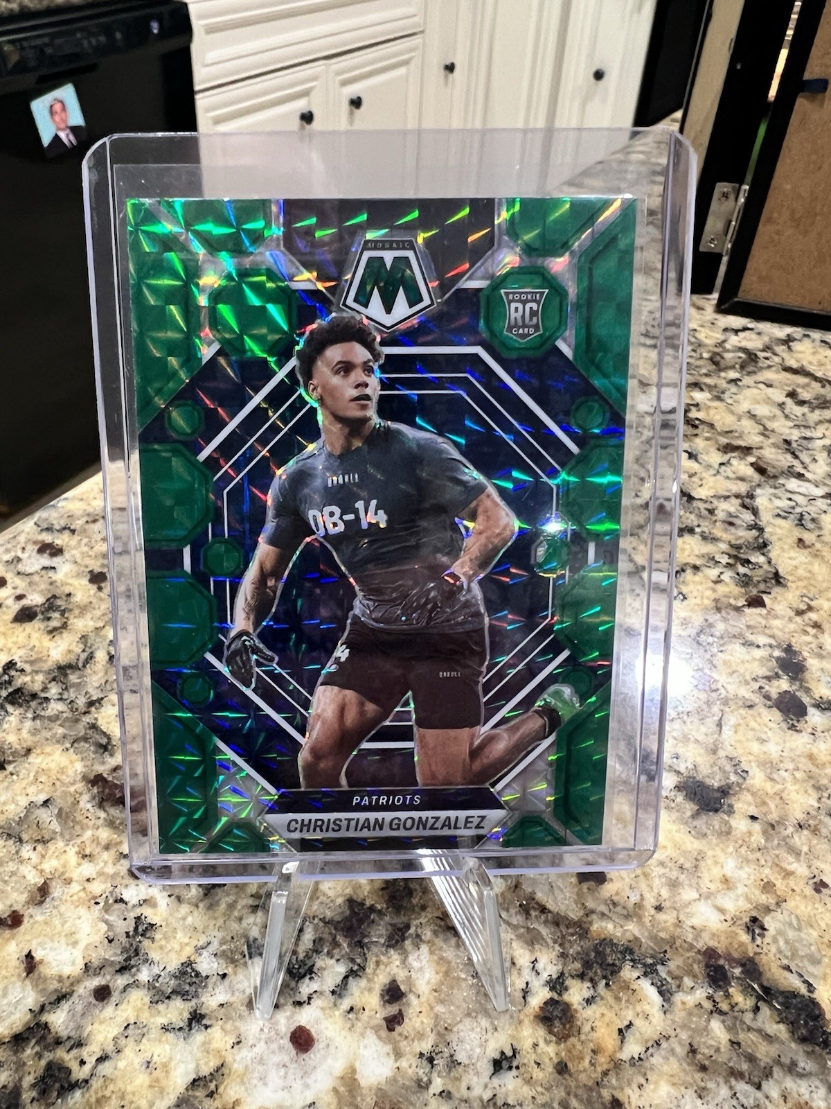 2023 Panini Mosaic - Rookies Christian Gonzalez #300 Green Mosaic Prizm (RC)