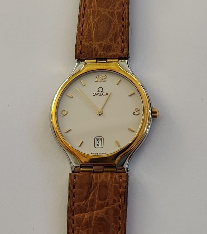Orologio vintage Omega acciaio e oro solo tempo, cuoio listino