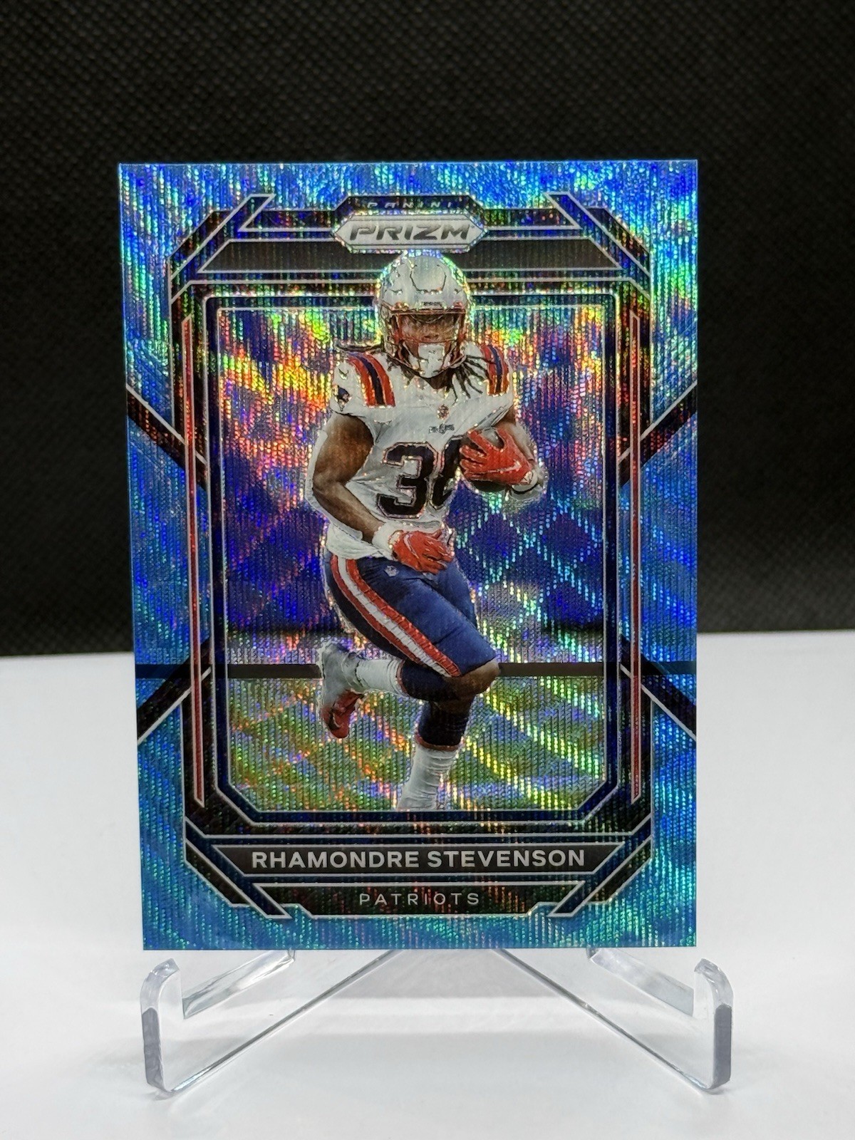2022 Panini Prizm Rhamondre Stevenson Blue Wave Prizm /199 New England Patriots