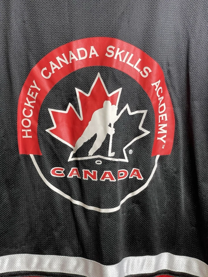 Camiseta deportiva de hockey Canada Skills Academy emitida por el jugador adulto grande negra #97 Foto 2 de 4