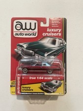 The Auto World 1976 Cadillac Coupe DeVille Ultra Red Chase