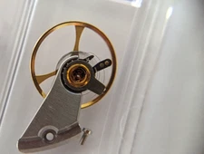 Jaeger Lecoultre 911 BALANCE COCK AND BALANCE COMPLETE WITH HAIRSPRING and screw