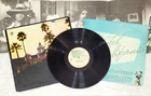 The Eagles Hotel California 1st Press Vinyl w/ poster LP Very Good Plus Tested