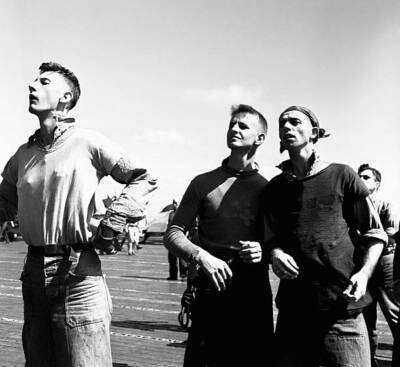 Crewmen watching planes return to USS Lexington after mission again- Old Photo