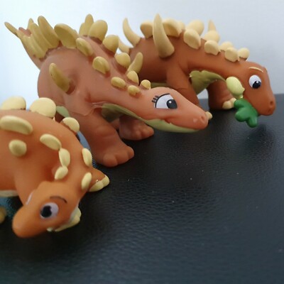 Lot of 4 Hard Plastic/ Rubber Dinosaur Prehistoric Toy Figures