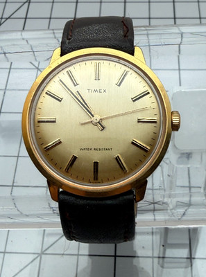 Vintage 1977 Timex Marlin 35mm Mechanical Hand-Wind Gold-Tone Champagne Dial