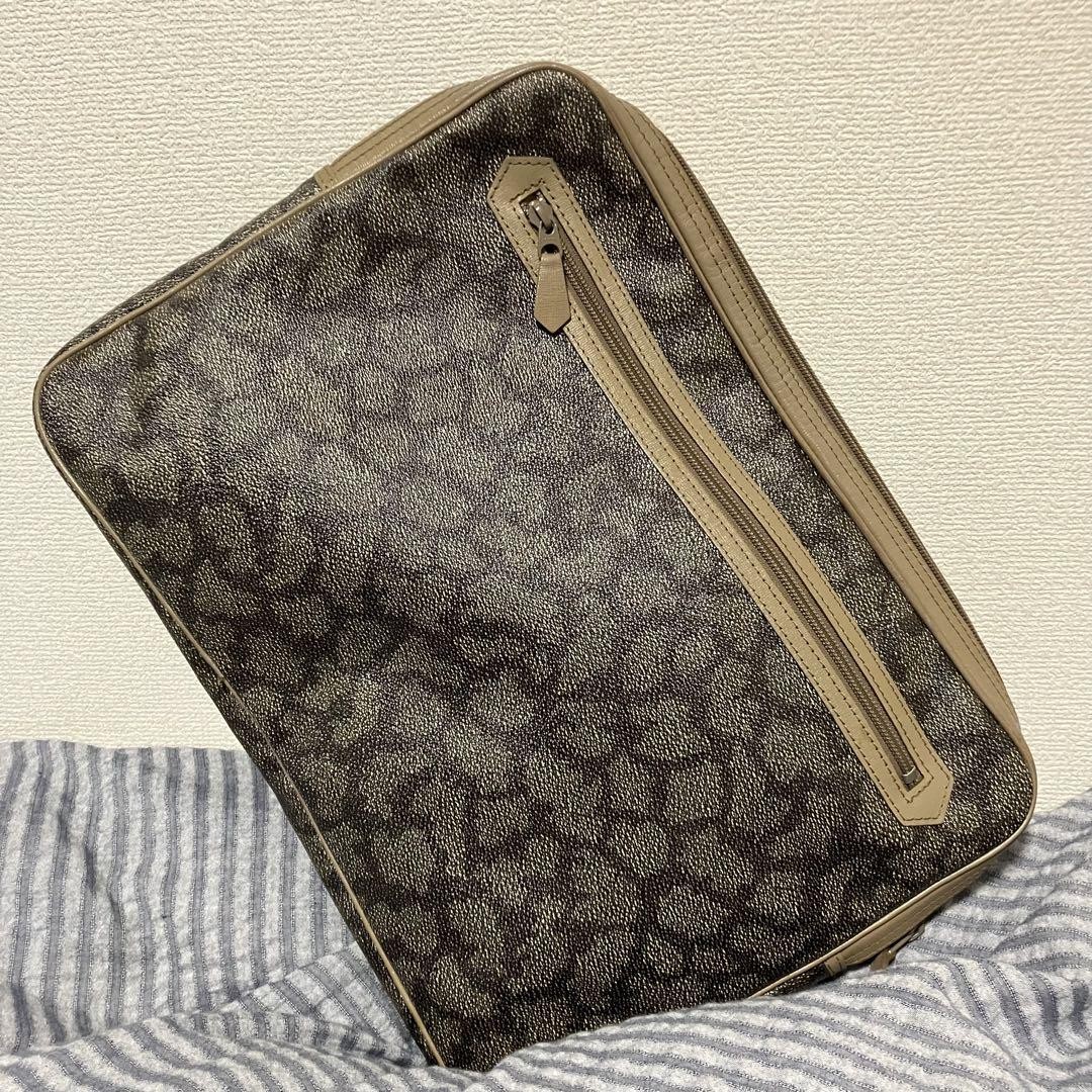 Yves Saint Laurent Pochette Borsa Grigio PVC Pelle