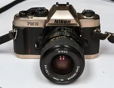 Nikon FM10 35mm SLR Film Camera with 35-70 mm Near Mint