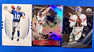 Eli Manning 2007 UD SP Authentic & 22 Chronicles DP & 24 Topps Chrome Black