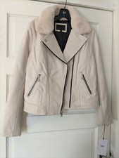 Chaqueta de ciclismo de cuero UGG para mujer talla L marfil ANDEE cuello de piel extraíble nueva con etiquetas