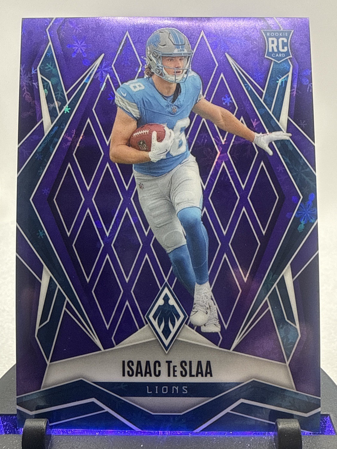2025 Panini Phoenix - Rookies Isaac Teslaa #189 Purple Winter /249 (RC)