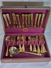 52 pc Enchanted Rose Pattern Gold Plated Flatware William Rogers Naken Chest