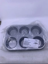 NIP BLUE LARGE MUFFIN PAN.