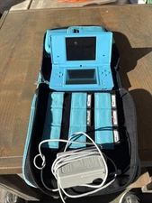 Nintendo DSi Handheld System Blue with Charger, Case And 5 Games !!! Mario Kart