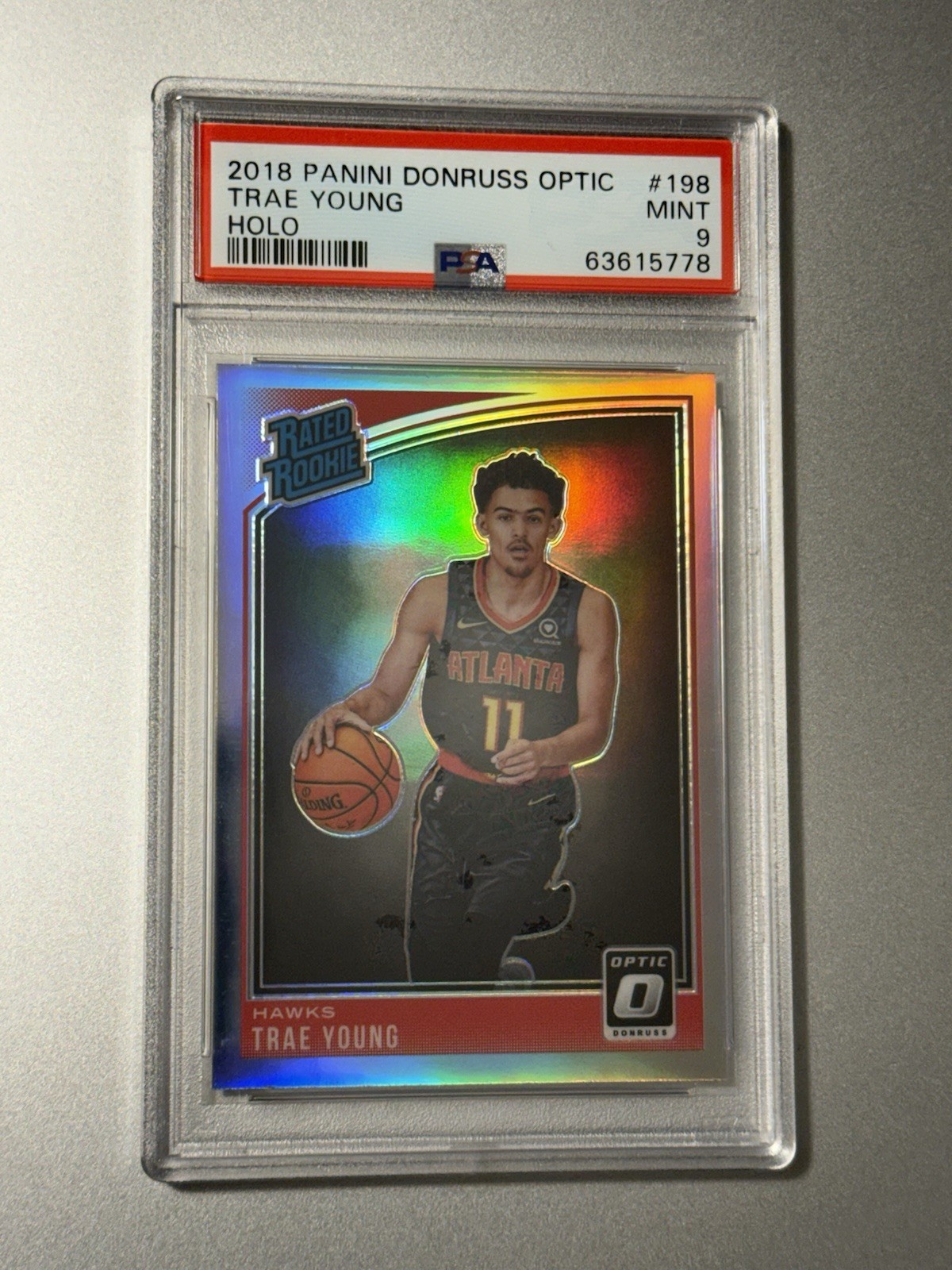 2018-19 Panini Donruss Optic Trae Young #198 Holo Prizm (RC) PSA 9