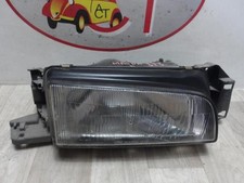 Feu avant (phare) Mazda 323