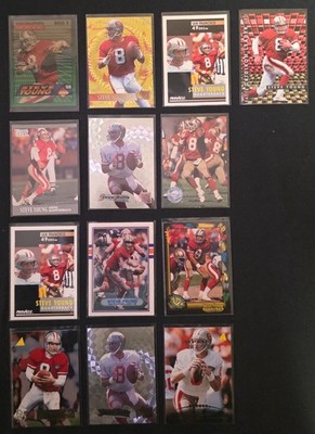 13 card collection of San Francisco 49ers football cards featuring Steve Young.