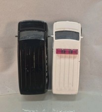 Matchbox Ford Panel Van Pair - White 2009 & Police Squad "SWAT" Black 2010