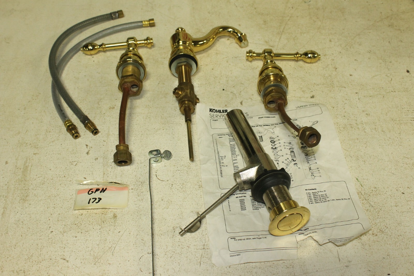 KOHLER K68114PB Brass® Widespread bathroom sink faucet lever