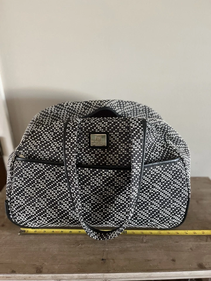 Bolsa de lona con ruedas negra para equipaje Anne Klein AK Foto 2 de 4