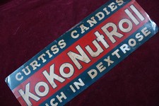 ** VINTAGE CURTISS CANDIES KOKONUT ROLL TIN TACKER SIGN ORIGINAL ADVERTISING **
