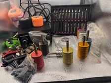 Beginner Tatoo kit, contains 3 tatoo guns, Power source, several needle holders
