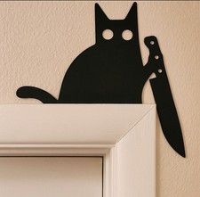 Cat with knife door toppers