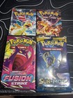 4 BOOSTER PACK BUNDLE (1x Fusion Strike 1x Sun And Moon Base 2x Obsidian Flames)