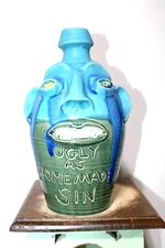 ) randy tobias   face jug, pottery, folkart 13''x8'''