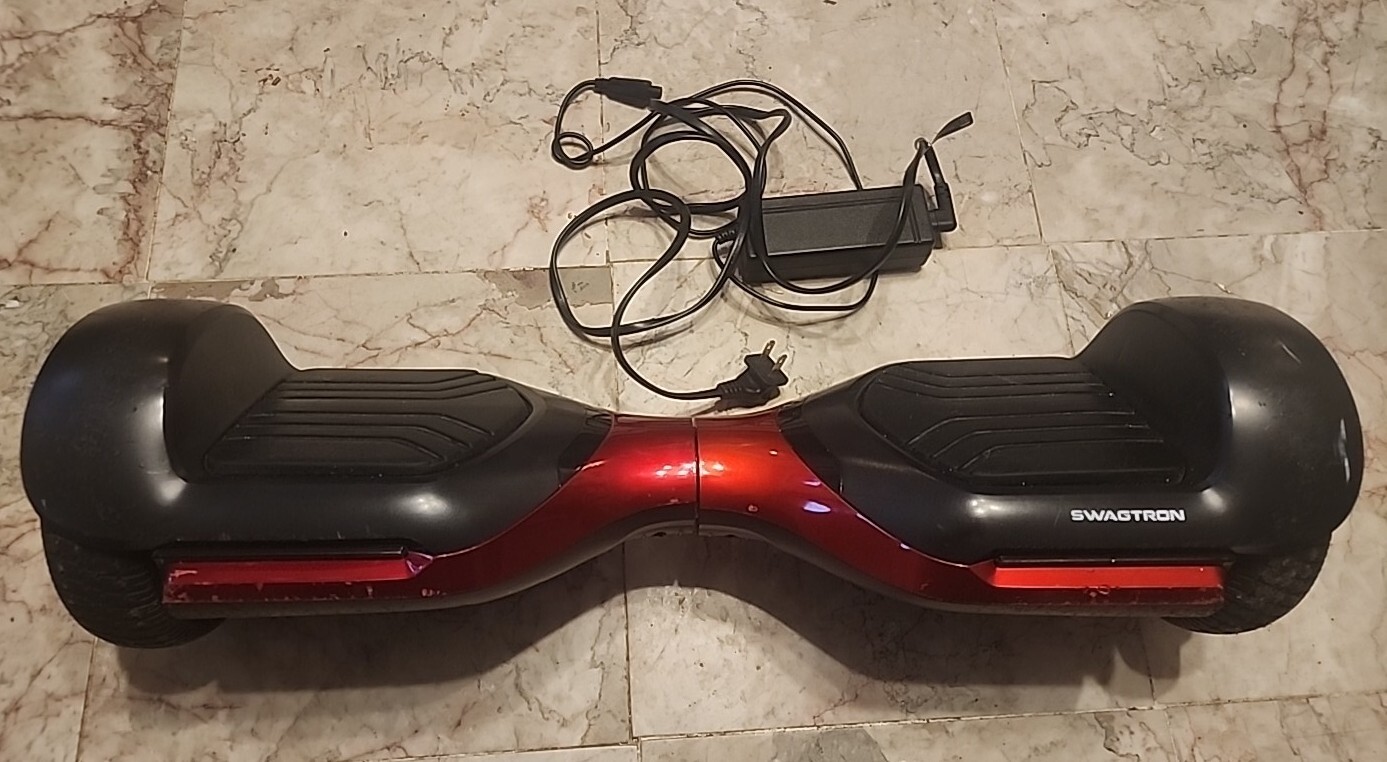 T580 Self Balancing Electric Scooter Red & Charger        H9