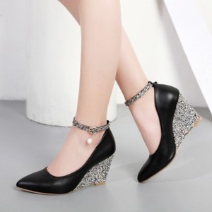 pointed toe wedge pumps
