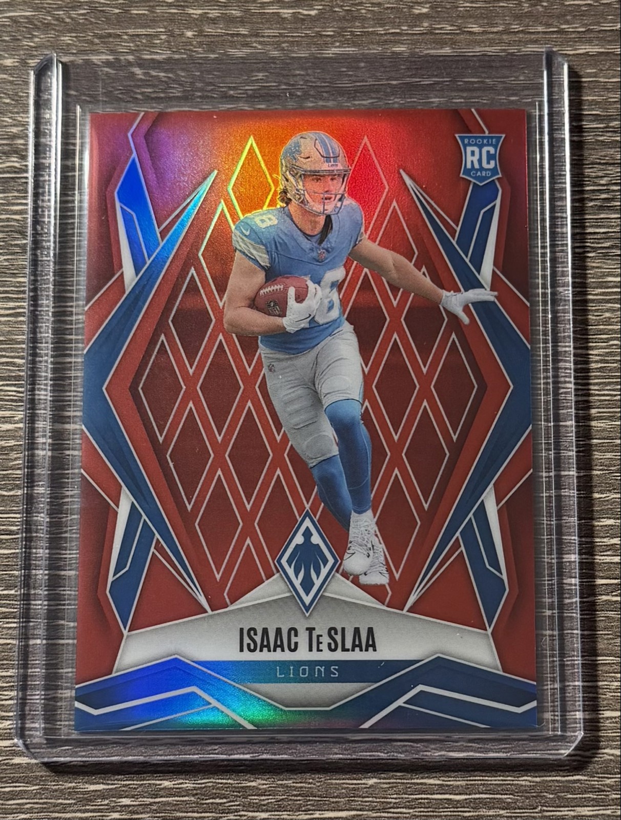 2025 Panini Phoenix - Rookies Isaac Teslaa #189 Red /99 (RC)