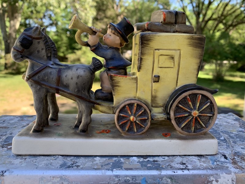 This is a Goebel M.I. Hummel "The Mail Is Here" figurine (#226) featuring a boy