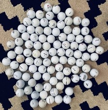 100 golf balls 2A/shag. Assorted brands and models. See photo.