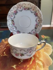 Antique L Bernardaud Limoges France D & C Cup & Saucer Ribbon Florals Embossed