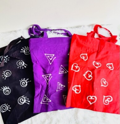 Tote Bags with zipper unique designs. 03 different colors Red , Black , Purple