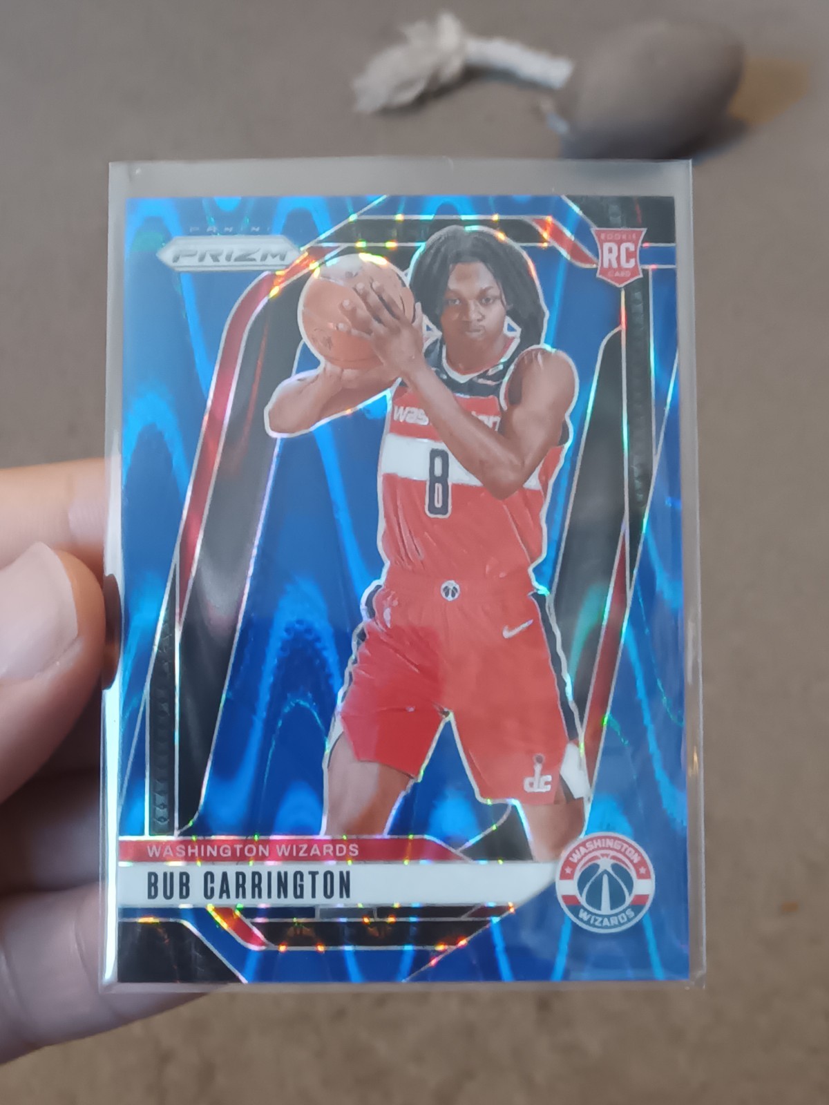 2024-25 Panini Prizm Bub Carrington #244 RC Blue Seismic Prizm 60/99 RC Wizards