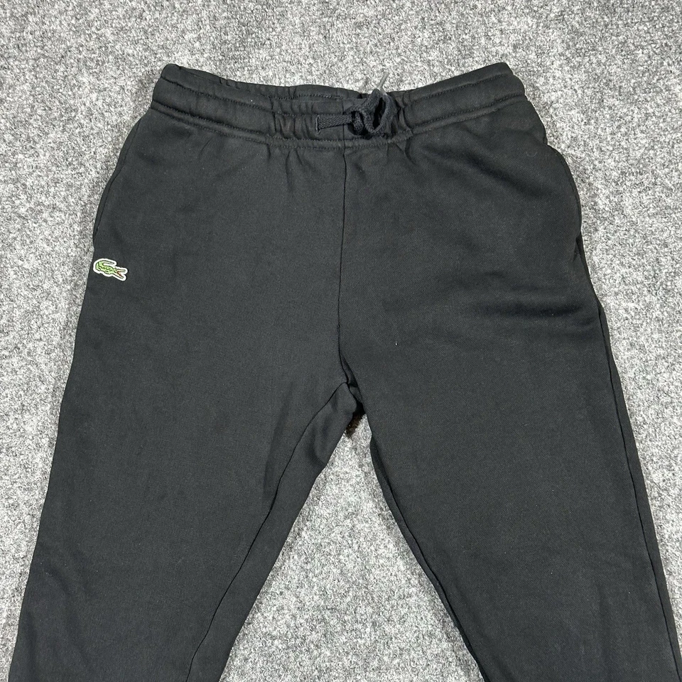 Pantalones deportivos Lacoste jóvenes niños mezcla de algodón negros informales salón unisex 12 Foto 2 de 4