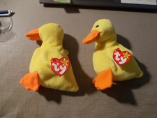 LOT OF 2 TY Beanie BABIES QUACKERS THE DUCK W/ PVC PELLETS 1-NURNBERG 1-ONTARIO
