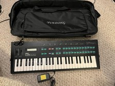 Yamaha DX100 - FM Synthesizer Keyboard W Power Cord And Case -Great Condition