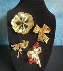 (4) VINTAGE COSTUME JEWELRY BROOCHES/PINS … ONE MARKED BROOKRAFT …