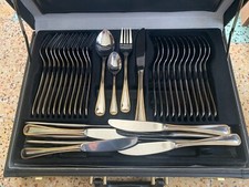 Ménagère SBS Bestecke 70 pièces Plaqué or  . 23/24carat