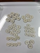 Buttons 7 sets White 2 hole - shank 41 ound plastic 1/2 - 3/4 in VTG